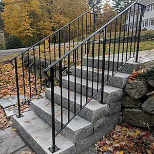 Straight railing on granite steps